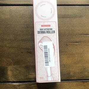 Root Activating Derma Roller - White & Coral Packaging